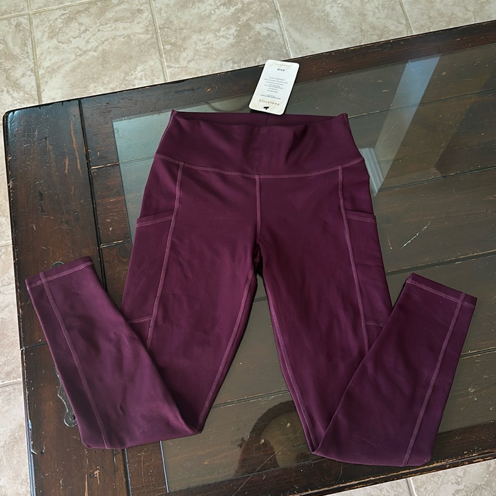 Only worn once Fabletics high wasted 7/8 leggings with side pockets!